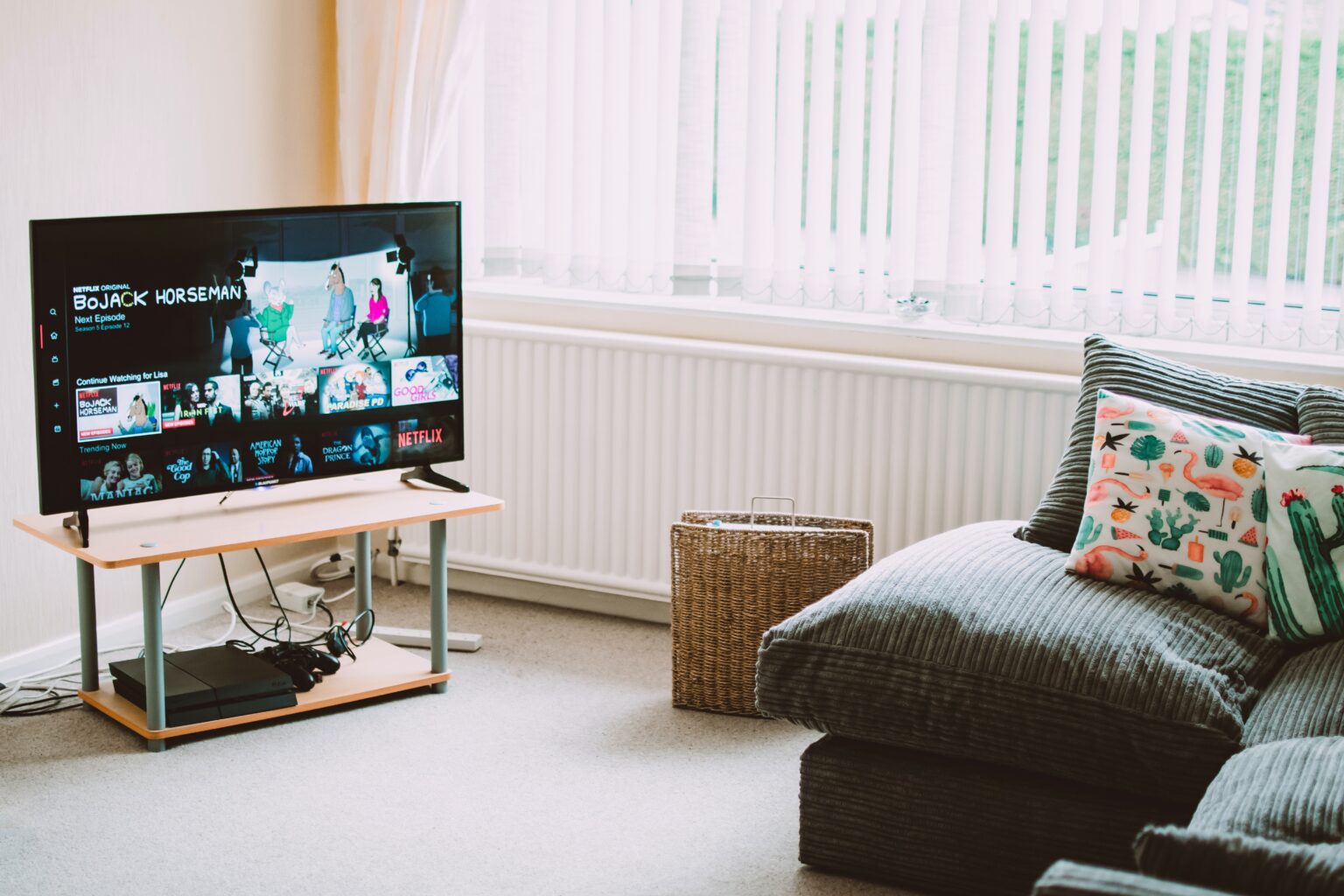 A living room with a small Smart TV in it