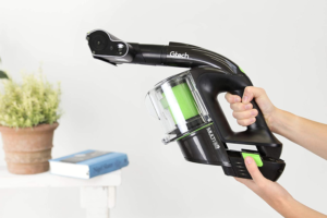 Hands holding a Gtech Cordless Car Vacuum Cleaner