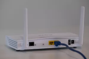 A 4G Router With External Antenna plugged in to an ethernet cable