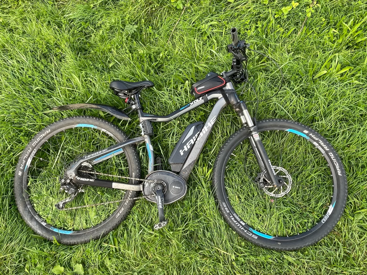 A Haibike xDuro HardNine RC Bike lead down on grass