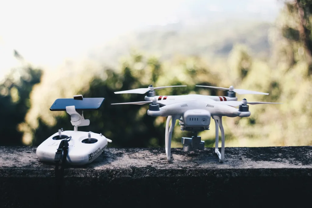 A drone and a controller on a wall