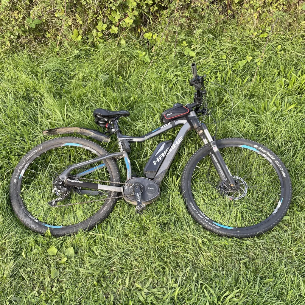 A Haibike xDuro HardNine RC Electric Bike lead down on grass